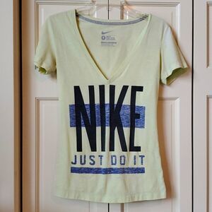 Nike Shirt, Size Small, Lime Green and Black.  has some Wear,